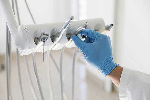 Professional Tooth Extraction technician working in Houghton, NY